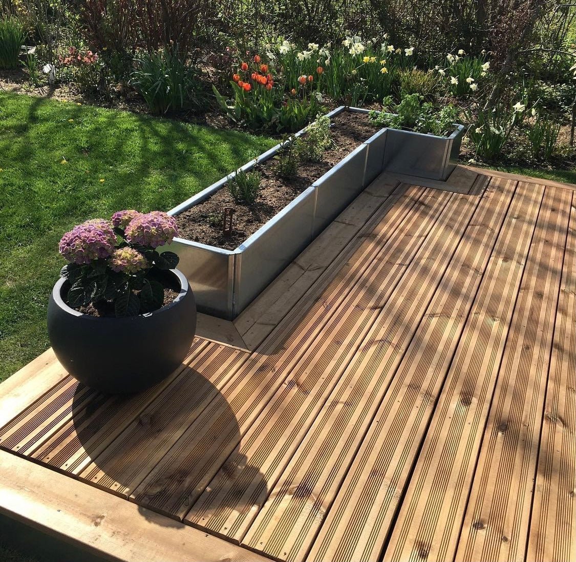 edgy-cortenstaal-terrasse-trae-no