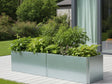 EDGY lang lav plantekasse i galvanisert stål med tett grønn beplantning