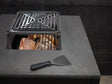 Grillspatel med ergonomisk håndtak og stålblad